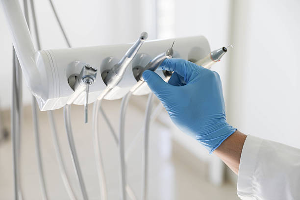 Professional Dental Implants technician working in Roma, TX